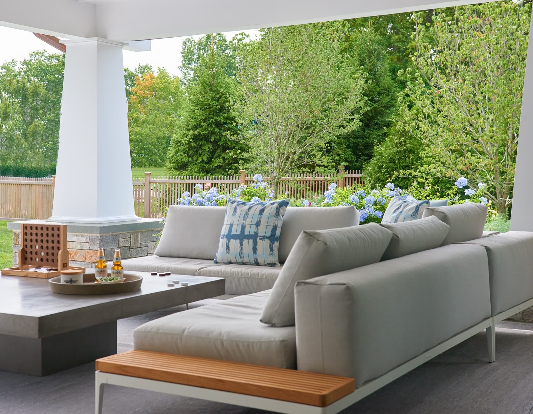 Covered porch looking onto a garden