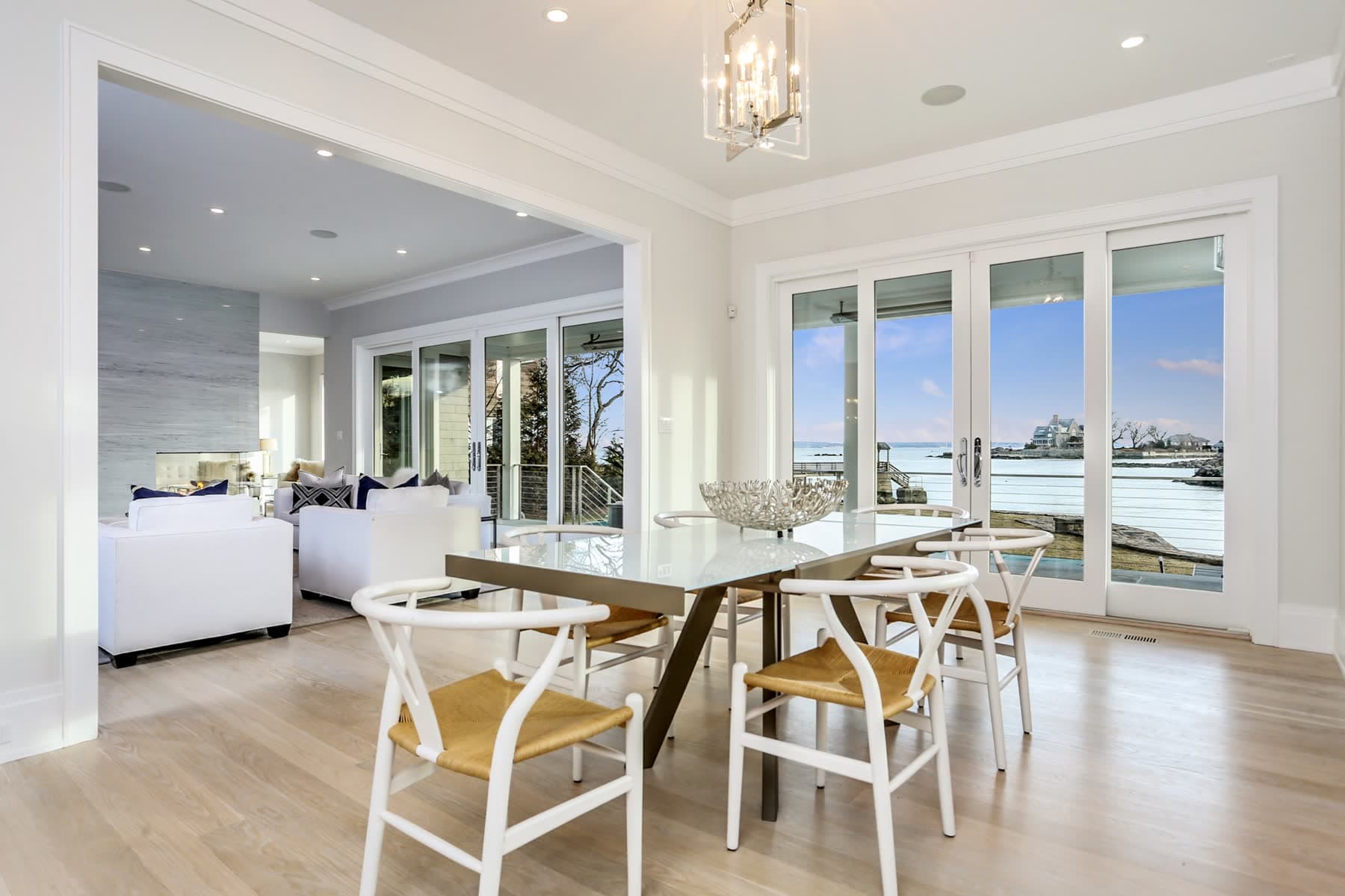 Dining room opening to Long Island Sound at 4 Philips Lane
